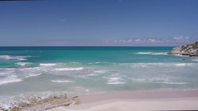 4k 60p footage of stunning golden sands meeting turquoise waters along Arniston&rsquo;s beautiful Overberg coastline, Western Cape, South Africa. Iconic, remote beach serenity.