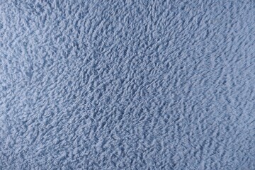 Light blue towel texture background with soft fluffy terry cloth surface. © Fajri Mulia Hidayat