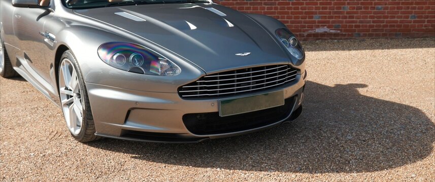 2011 Aston Martin DBS Volante, Luxury Car. sports car on the road