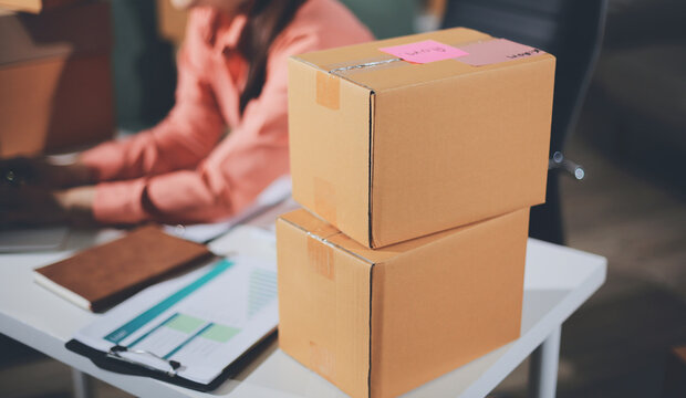 Startup, small business, SME owner check online orders. data logging Business growth, selling products, working with boxes. freelance work at home office online sme business small organization