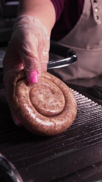Cooking a steak. A professional chef prepares delicious meat on a hot grill