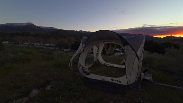 tent camping in the moutains at sunset slo motion footage no people
