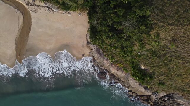 Toque-Toque Grande Beach in S&atilde;o Sebasti&atilde;o, north coast, a paradisiacal beach amidst the mountains.