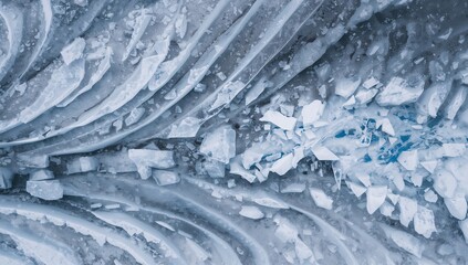 Revealing fractured layered ice field over frozen pack, showing central crevasse with broken slabs