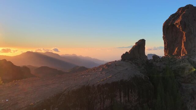 drone shot of Gran Canaria natural landmark, Roque Nublo at sunset, tourism on the Canary Islands, Spanish Atlantic islands