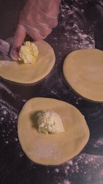 We prepare traditional dumplings with stuffing.