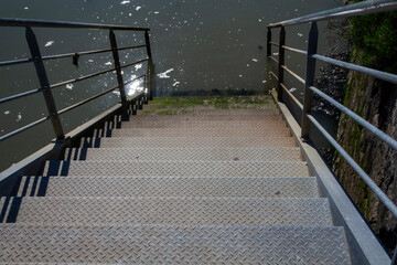 Metallic staircase leading to water - Pontoon - Isle of Oléron - Oléron Island - Charente-Maritime - Nouvelle-Aquitaine - France © Collpicto