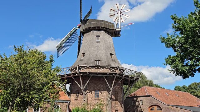 Windmill in Jever in East Frisia with brick building