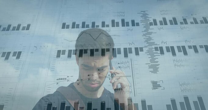 Man answering phone call rooftop, speaking and parsing business metrics while charts overlaying him