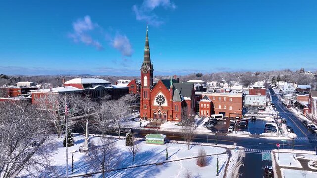 First Congregational Church aerial view in winter with snow at 2 E Central Street in historic town center of Natick, Massachusetts, USA.