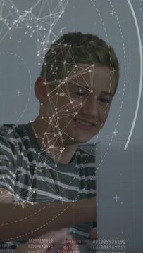 Vertical video: Teen student seeing network HUD, shifting gaze and typing on laptop for tech study