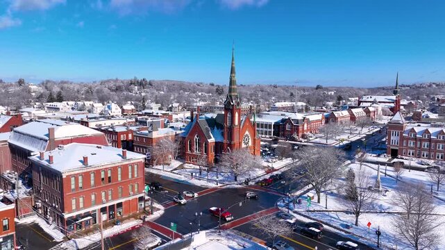 First Congregational Church aerial view in winter with snow at 2 E Central Street in historic town center of Natick, Massachusetts, USA.