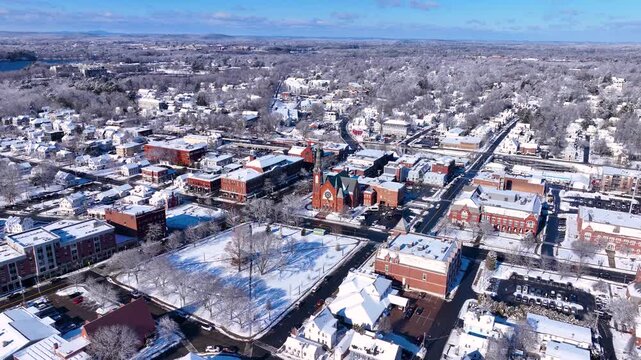 First Congregational Church and Town Common aerial view in winter on Central Street in historic town center of Natick, Massachusetts, USA.