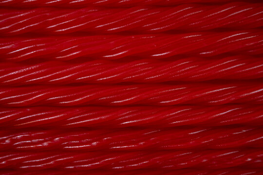 Texture macro de r&eacute;glisse rouge torsad&eacute;e
