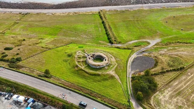 Carn Liath Broch Archaeological Site along the North Coast 500 NC500 Road Trip, Iconic Scottish Landmark Aerial Footage, Sutherland Travel Destination