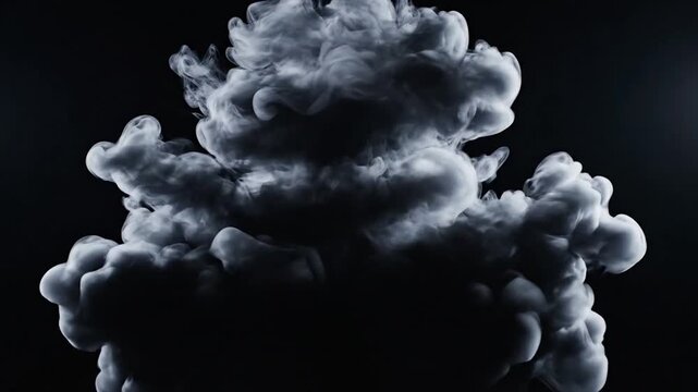 A large gray cloud against a dark background.