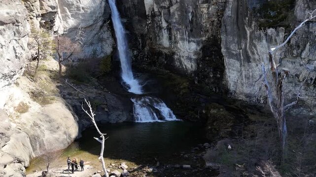 Chorrillo del Salto waterfall in El Chalten, Patagonia. Beautiful cascade surrounded by native forest and rocky cliffs.