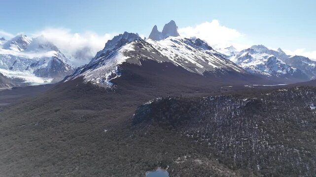 Majestic Mount Fitz Roy (Cerro Chalten) at sunrise. Iconic granite peaks and glaciers in Los Glaciares National Park.