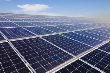 Photovoltaic panels for producing clean ecological electric energy. Commercial building with solar roof. Renewable electricity with zero emission concept © bilanol