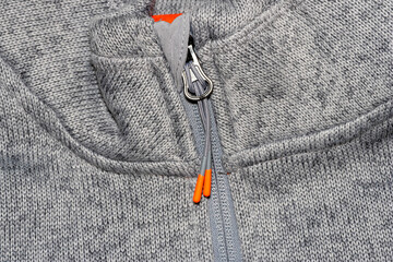 Close up of gray knit fabric zipper © SNEHIT PHOTO