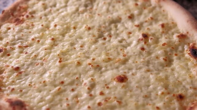 Pepperoni pizza close up spinning on table. High quality FullHD footage