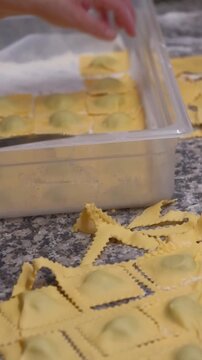 Hands Sculpting Italian Pasta With Flour, Skilled Chef Making Homemade Italian Pasta Using Fresh Ingredients, Preparing Traditional Italian Pasta Ravioli In Kitchen, Authentic Cooking Process