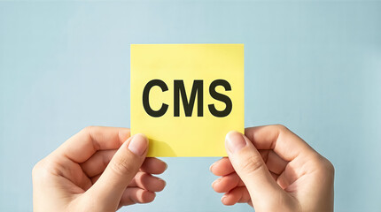 Yellow sticky notes being held against light blue background showing letters c m s in sequential frames