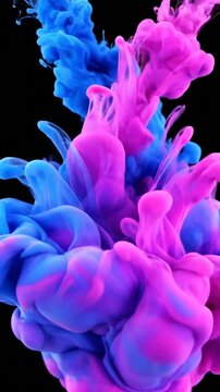 Vibrant blue and pink ink swirling in dark water