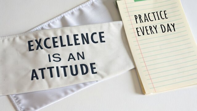 Motivational Banner and Notebook with Quotes on Excellence and Practice for Daily Inspiration and Personal Growth