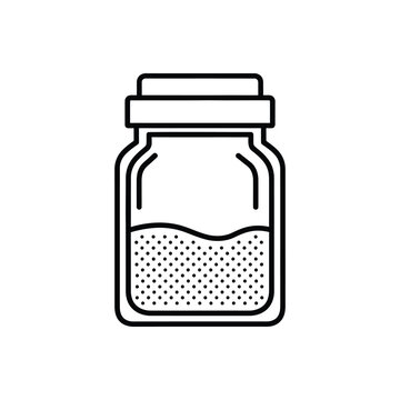 Glass jar with lid containing powder or granules, storage container for ingredients or substances, laboratory or kitchen equipment, concept of measurement