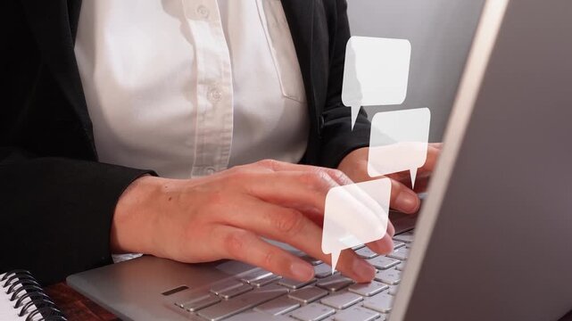 Focus on a businesswoman's hands on her laptop. An animation of several speech bubbles, in a chat format.