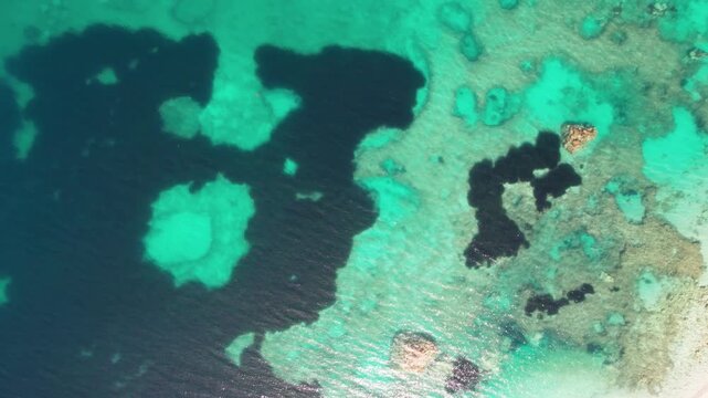 Aerial view of turquoise coastline waters near Vlore, Albania in summer