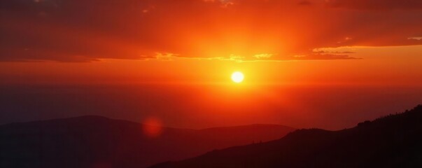 Obraz premium Intense orange sunset, blazing sun, thermometer registers extreme heat , blaze, july, hot