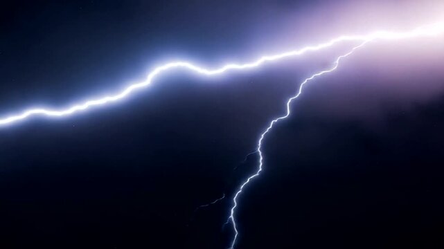 Electric Lightning Bolt Illuminating Dark Stormy Sky.