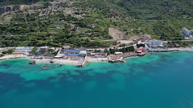 Scenic Adriatic coastline with vibrant waters and lush hills in Vlore, Albania