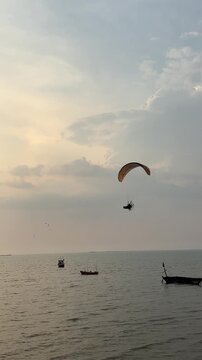 paraglider over the sea