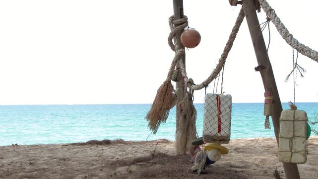 Fishing Gear and Floats Hanging on a Tropical Beach in Phuket