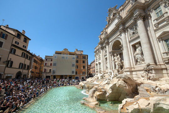 Tourists Gathering Around the Trevi Fountain on a Summer Day - Rome, Italy