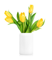 Fototapeta premium yellow tulips in a white vase on a white isolated background