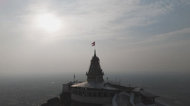 Bamleshwari Temple Dongargarh aerial drone view, Maa Bamleshwari Mandir hilltop temple Chhattisgarh, Hindu temple with red flag Bamleshwari Dongargarh, Sacred Bamleshwari temple tower drone shot India