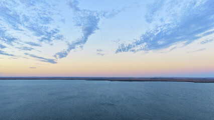 Obraz premium Ceduna and Thevenard, South Australia: 4K aerial drone view of Flinders Ports Thevenard, ocean, beach and Spencer Gulf at golden sunset time