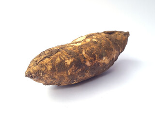 Raw Cassava Root with Soil Isolated on White Background