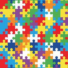 A vibrant, colorful collage of interlocking puzzle pieces forms a playful pattern