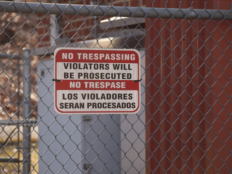 A No Trepassing sign on a fence