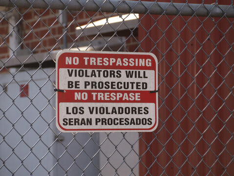 A No Trepassing sign on a fence