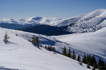 Fototapeta premium ski resort in austria, Leaota Mountains, view from Bucsa Peak, Romania