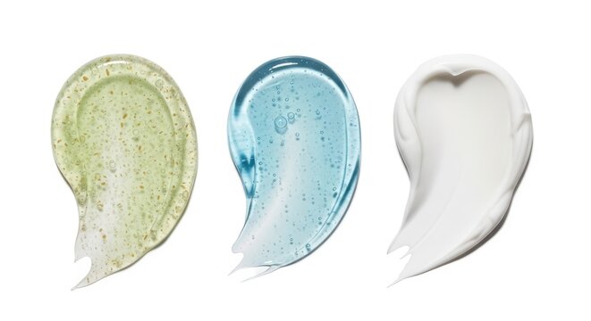 Three Colorful Swirls of Creamy Cosmetic Products on White Background