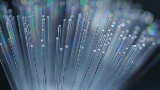 Fiber optics strands transmit data, creating technology and communication concept. 