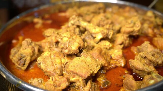 Delicious Spicy Chicken Curry Prepared with Traditional Indian Spices and Herbs