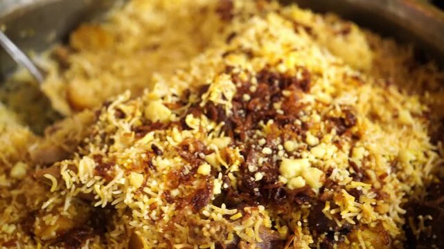 Traditional Kolkata-Style Mutton Biryani: Aromatic Saffron Rice with Succulent Meat